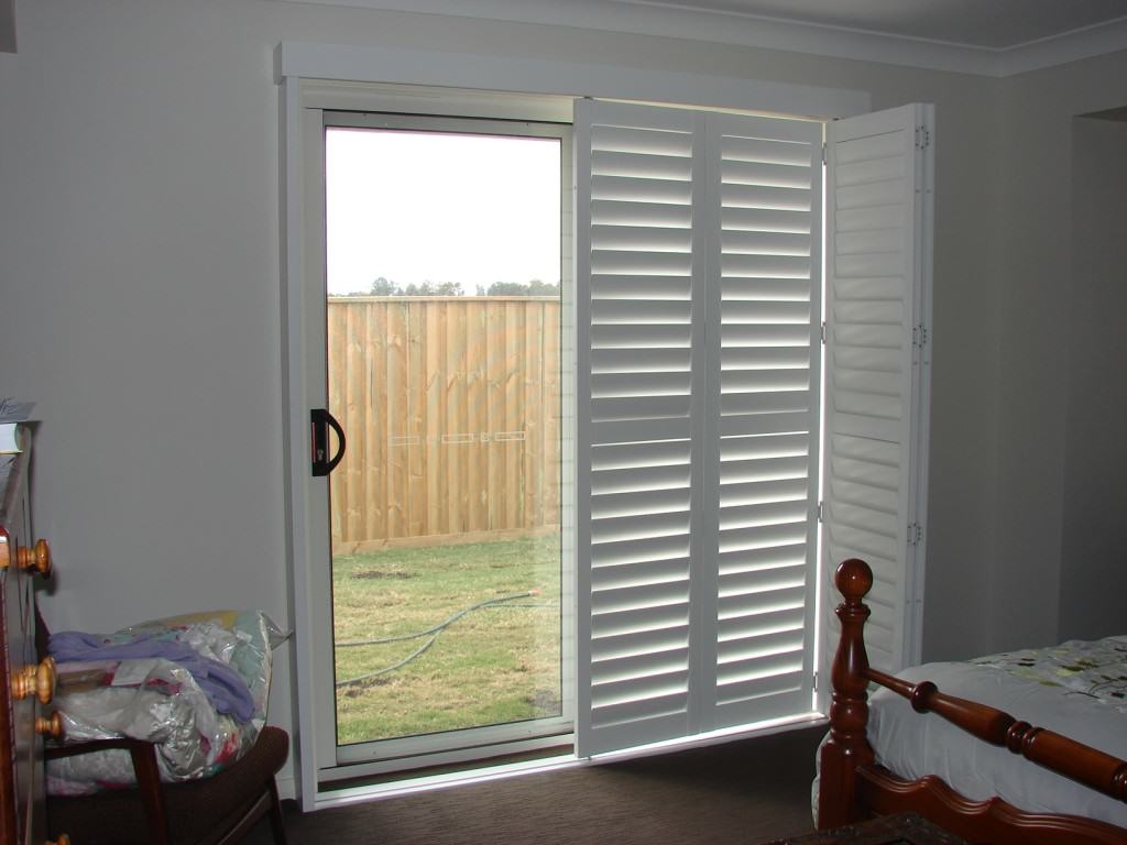 Plantation Shutters Over Sliding Glass Door