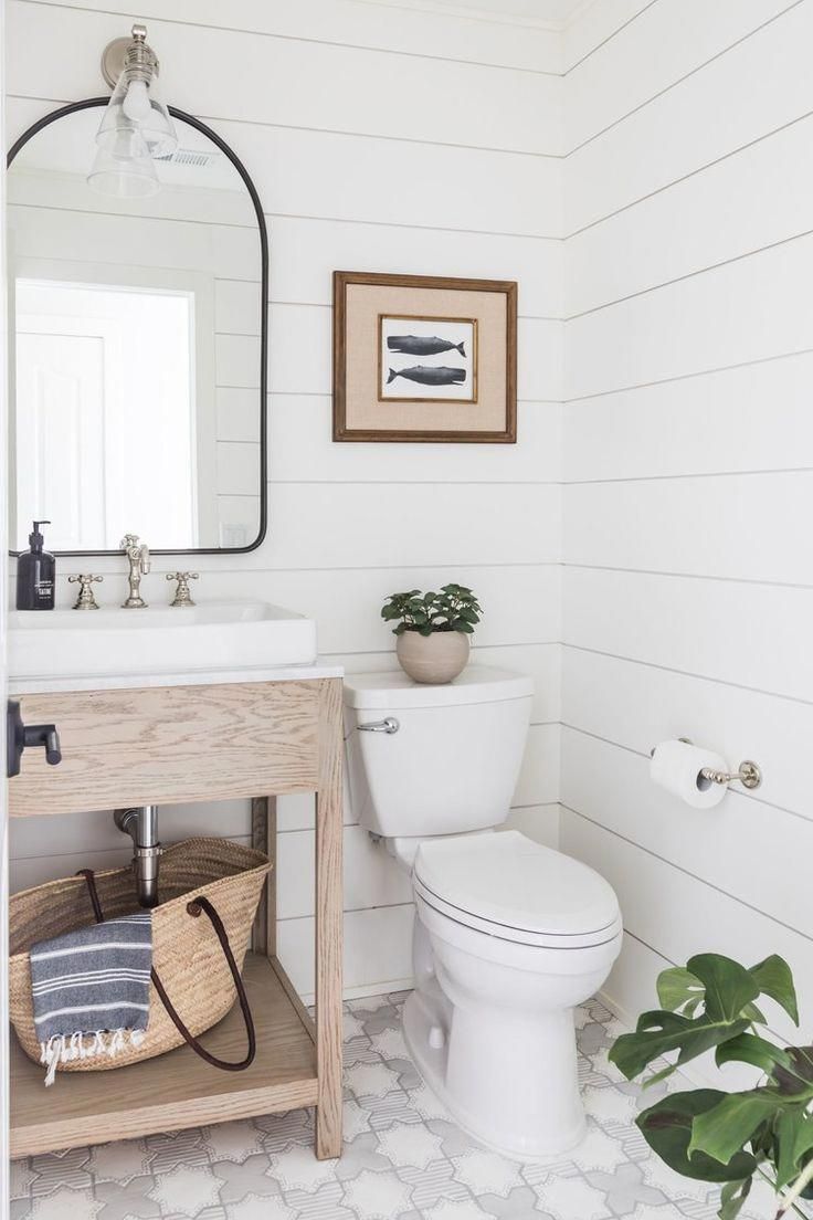 coastal farmhouse bathroom // shiplap walls // light wood vanity