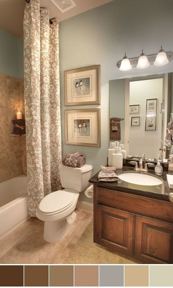 the bathroom is decorated in shades of brown, beige and blue with