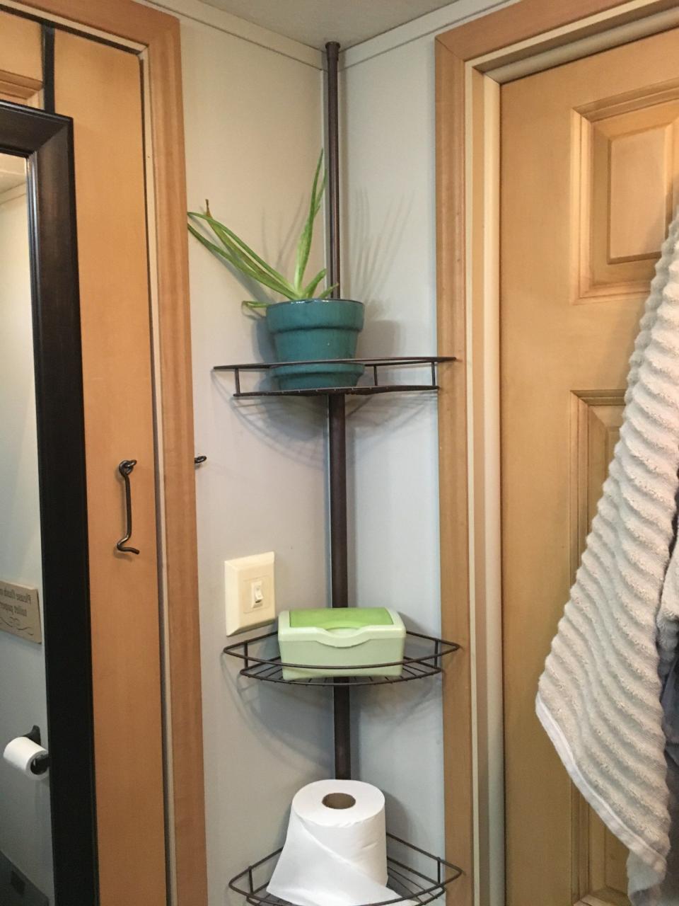 Shower shelf extra storage idea for bathroom organization in campers