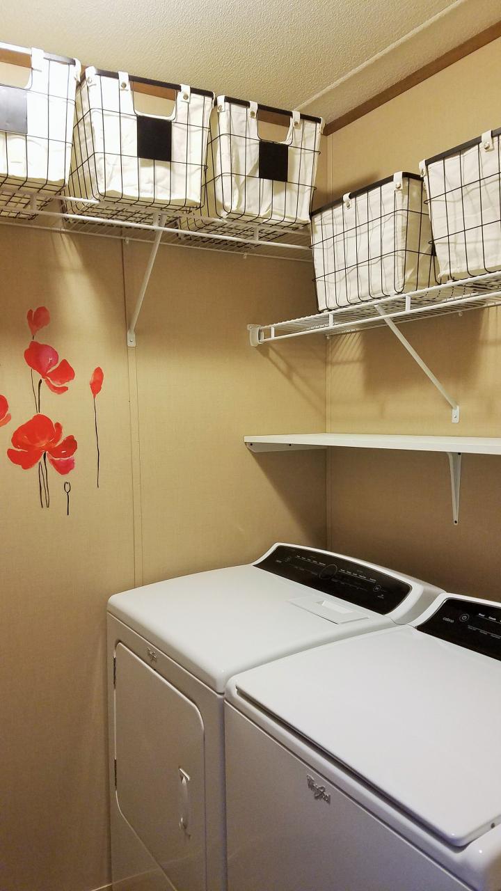 Originally this laundry room only had one wire shelf above the washer