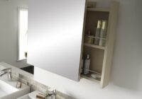 Practical and sleek mirrored bathroom with sliding storage