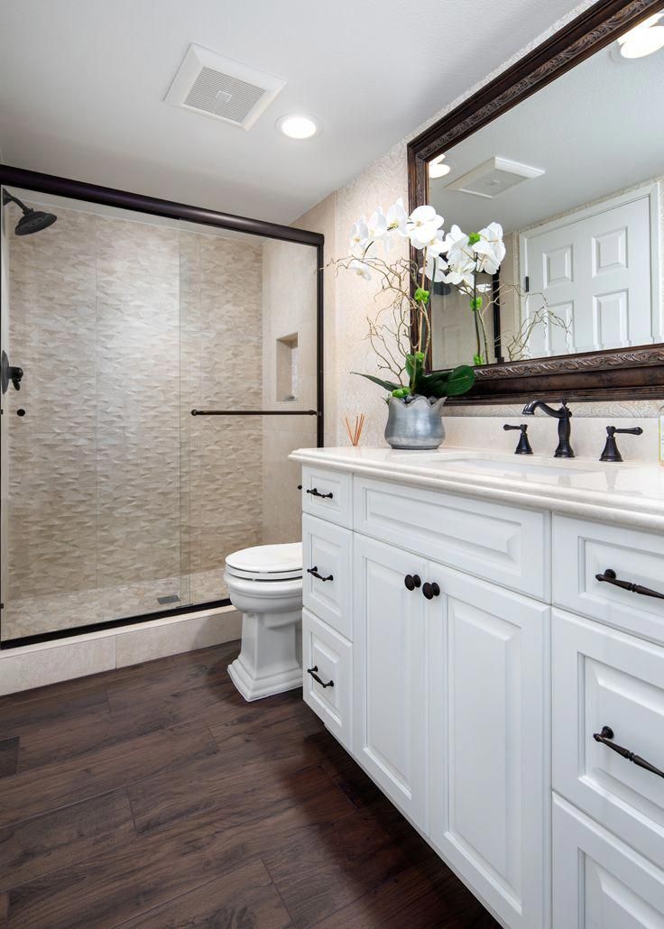 Hall bathroom remodel with Quartz countertops, white raisedpanel