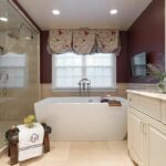 A large walkin shower and freestanding bathtub create a spalike vibe