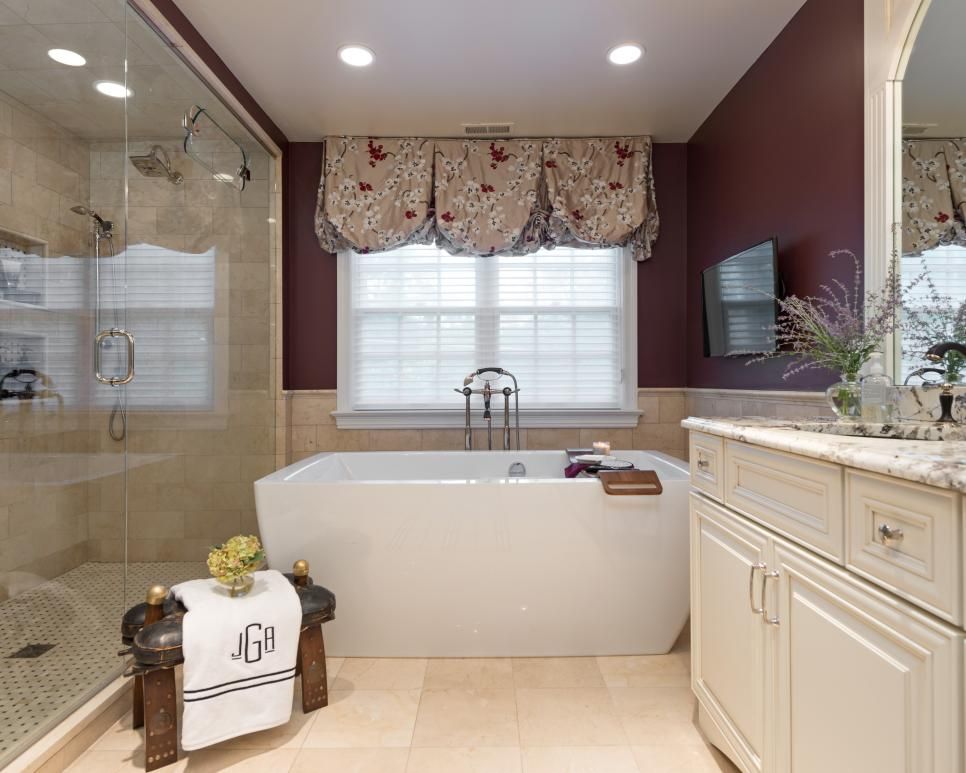 A large walkin shower and freestanding bathtub create a spalike vibe