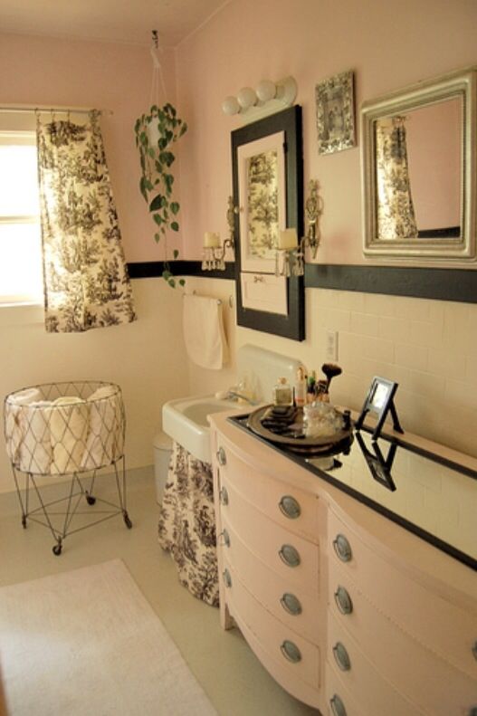 Pink and black bathroom in the San Francisco home of a photographer