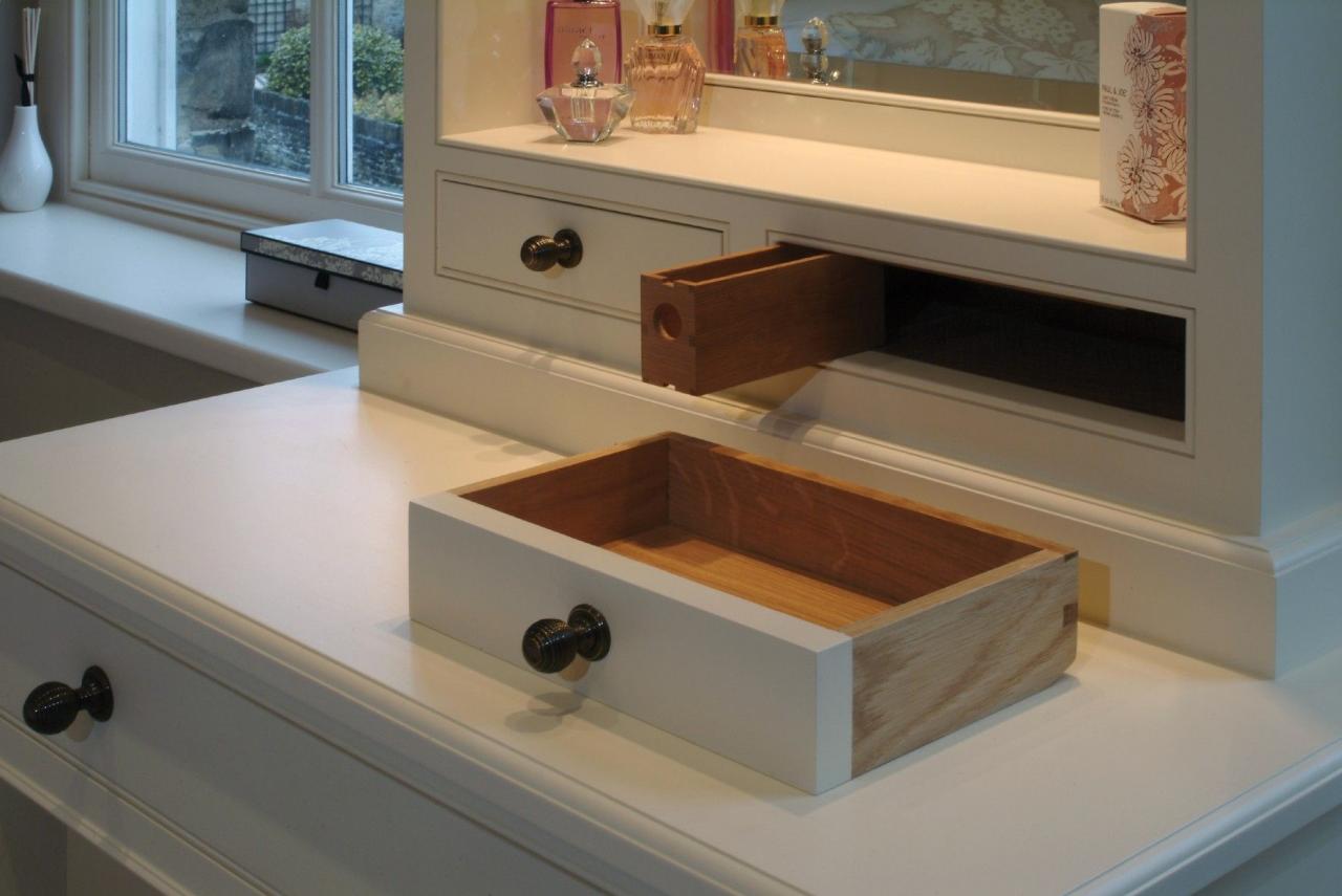 A secret drawer expertly hidden in a dresser by The Secret Drawer