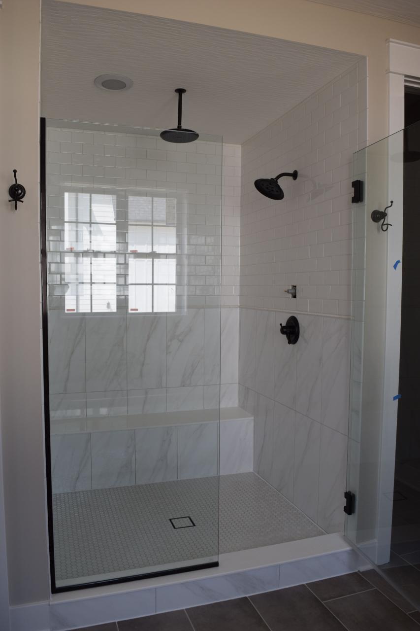 Get the look! This shower has a tile on the walls and floor