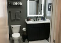 Grey bathroom / men's bathroom/ small / wood floor look / mirror