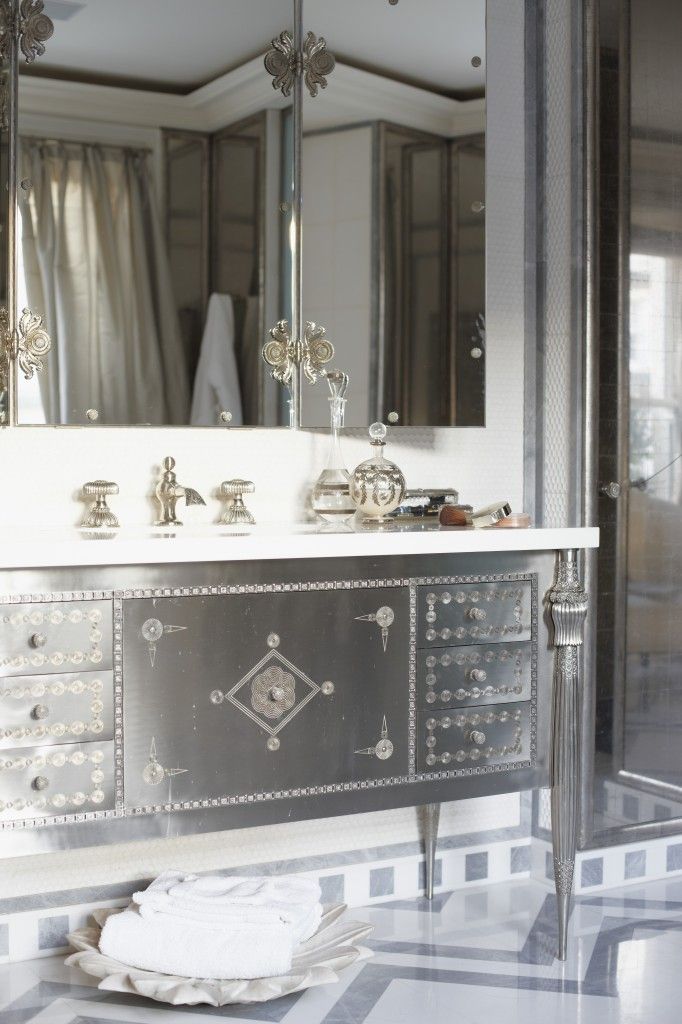 glamorous bathroom done in silver, gold, & white with this beautiful