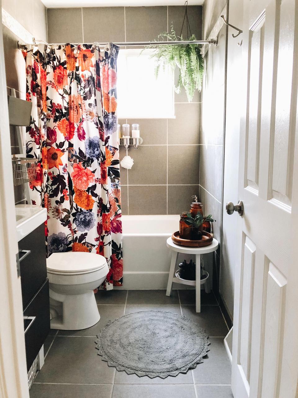 Botanical bathroom with floral Anthropologie shower curtain 