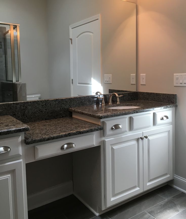 Master Bath with double vanities and dropped knee space. Wyoming