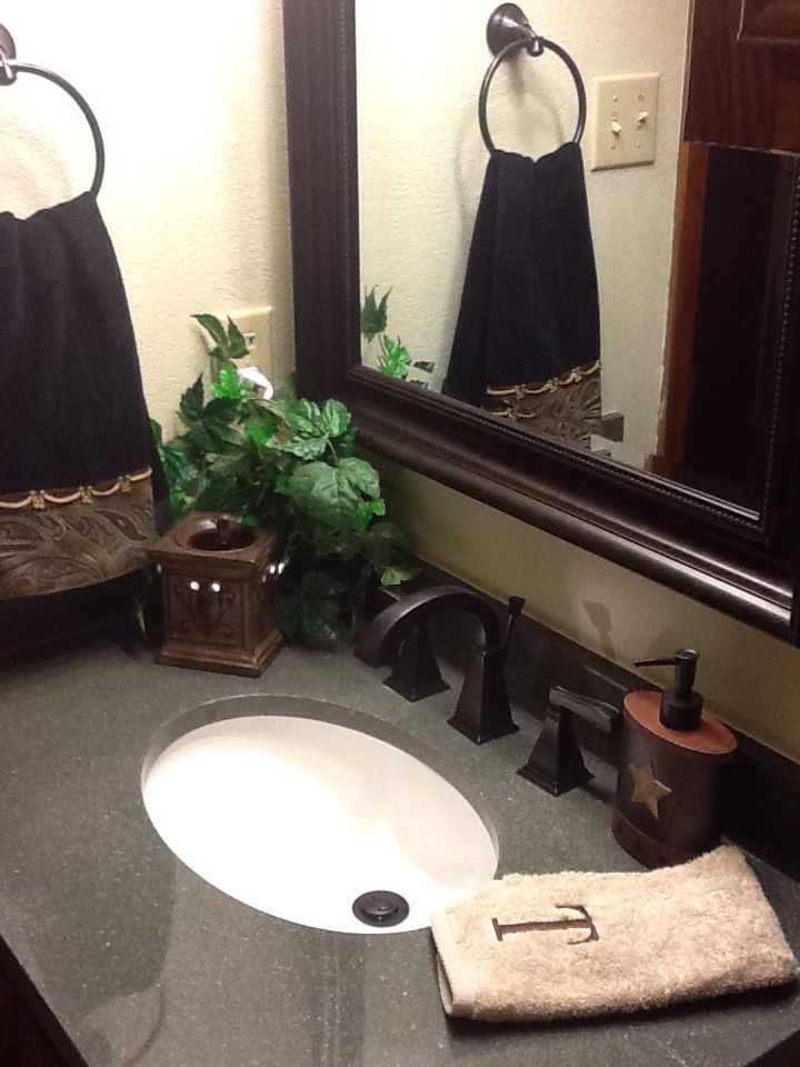Updated bathroom with a Classic Texas Decor. It's a nice change from