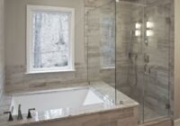 Bathroom remodel by Craftworks Contruction. Glass enclosed shower, drop