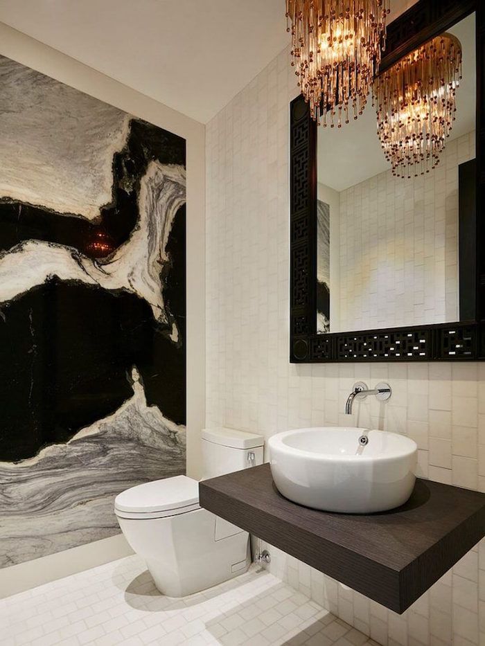 stoneeffect wall in black, white and grey, inside a bathroom with