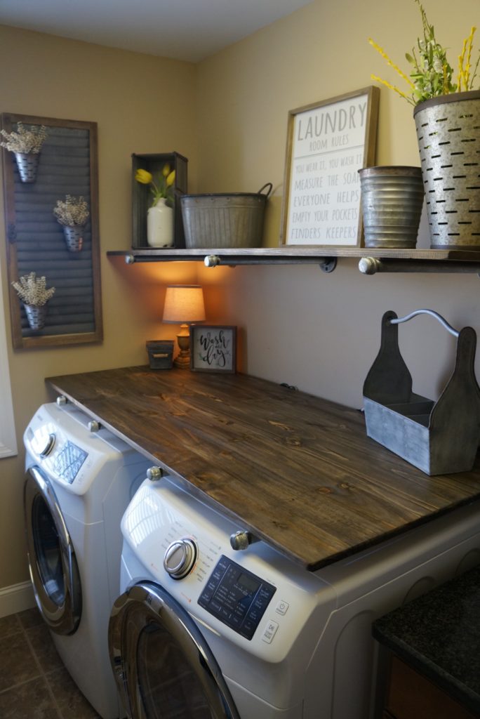 Laundry Room Makevover for under 250! With DIY Rustic Industrial Pipe