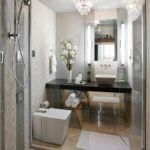 a sleek space with furnishings pared down the master bathroom invites