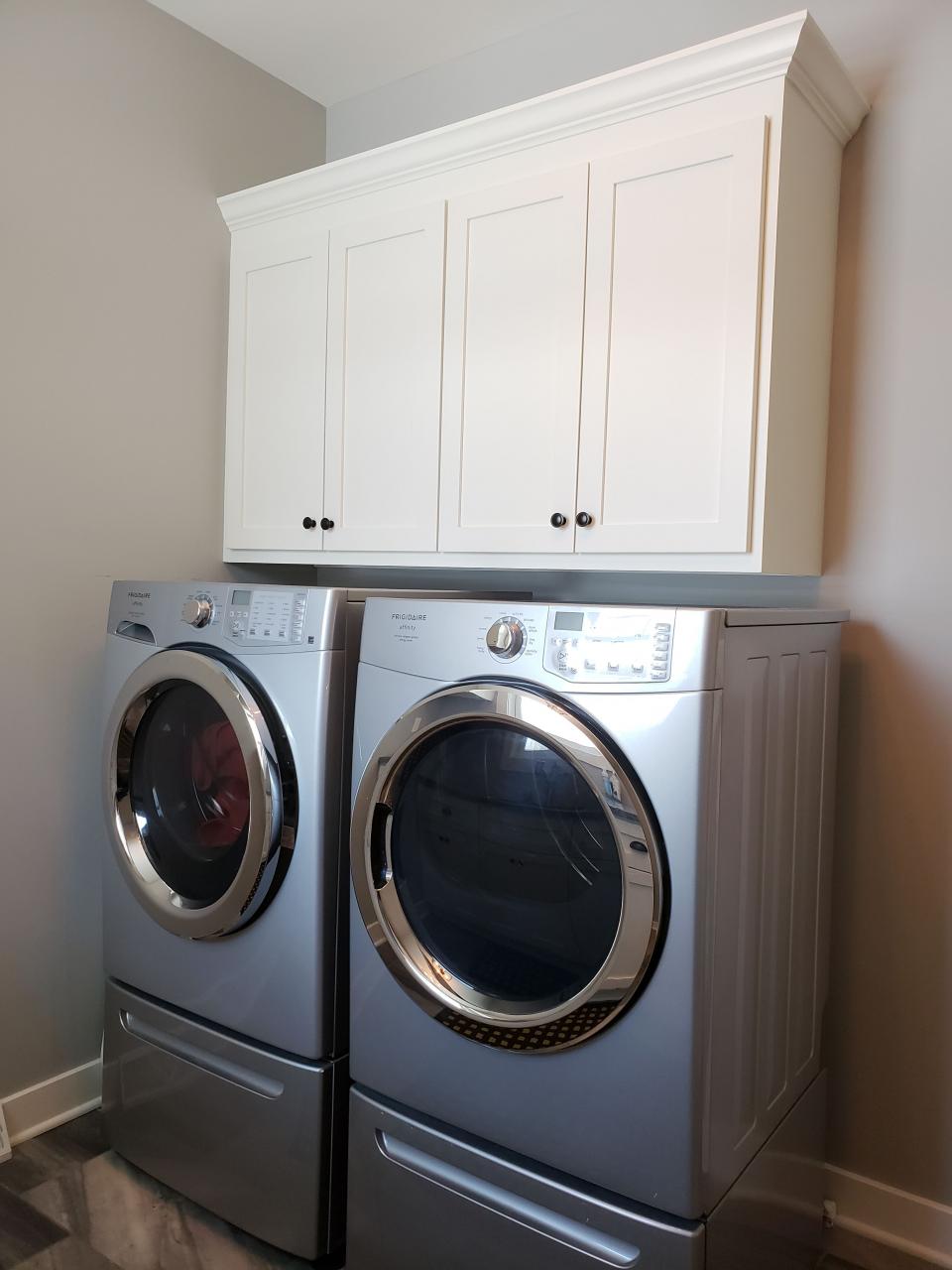 laundry room, upper over washer and dryer, storage