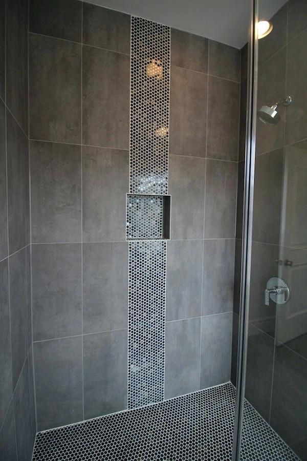 coordinating penny tile shower floor and vertical border with large