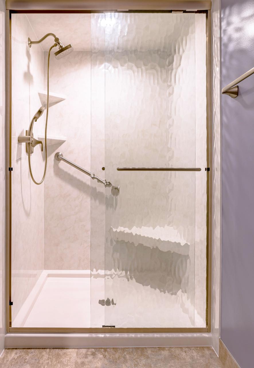 ReBath DuraBath Acrylic walkin shower in white marble. ADA corner