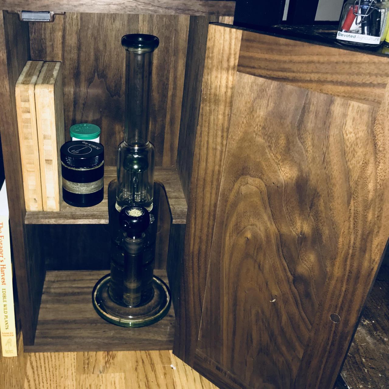 This lil bong a buddy of mine made for me. Dark walnut