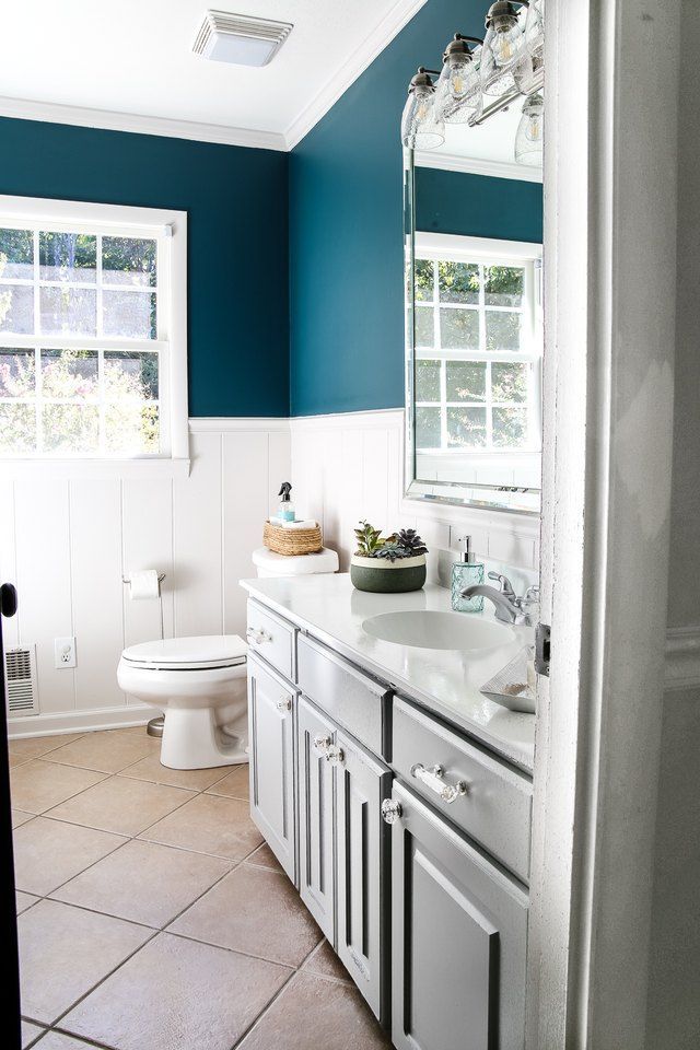 bathroom with teal accent walls and gray Bathroom
