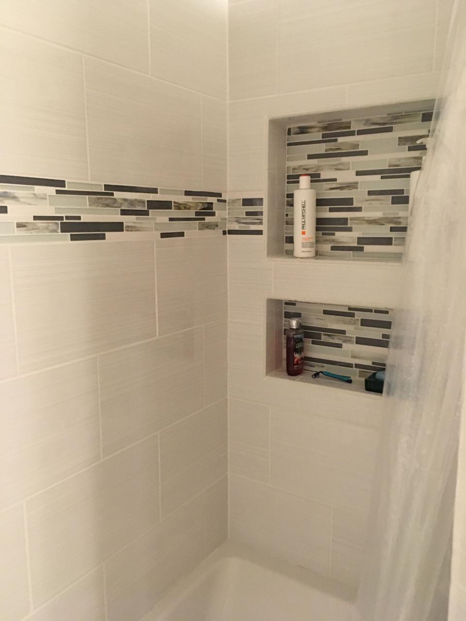 Used Lowes Blairlock white tile for our shower with white grout and