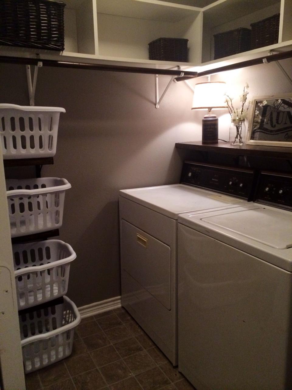 Our laundry room makeover added a 2x12 shelf above the washer and