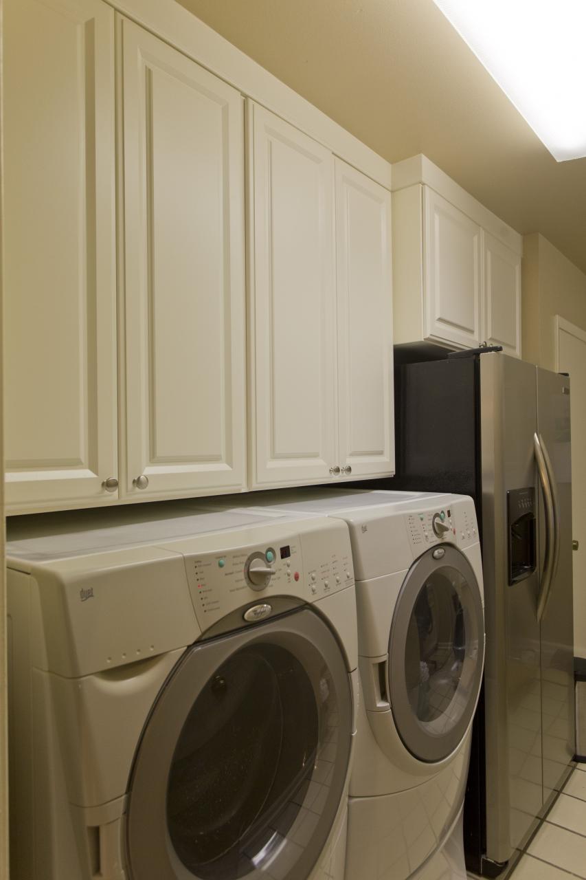 This Laundry room used to have wire shelves above. We added the 19