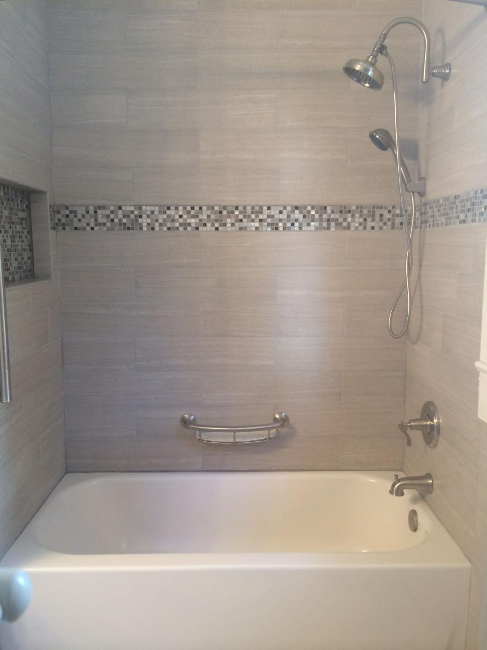 Tile tub surround. Gray tile around bathtub. Grey tile around bathtub