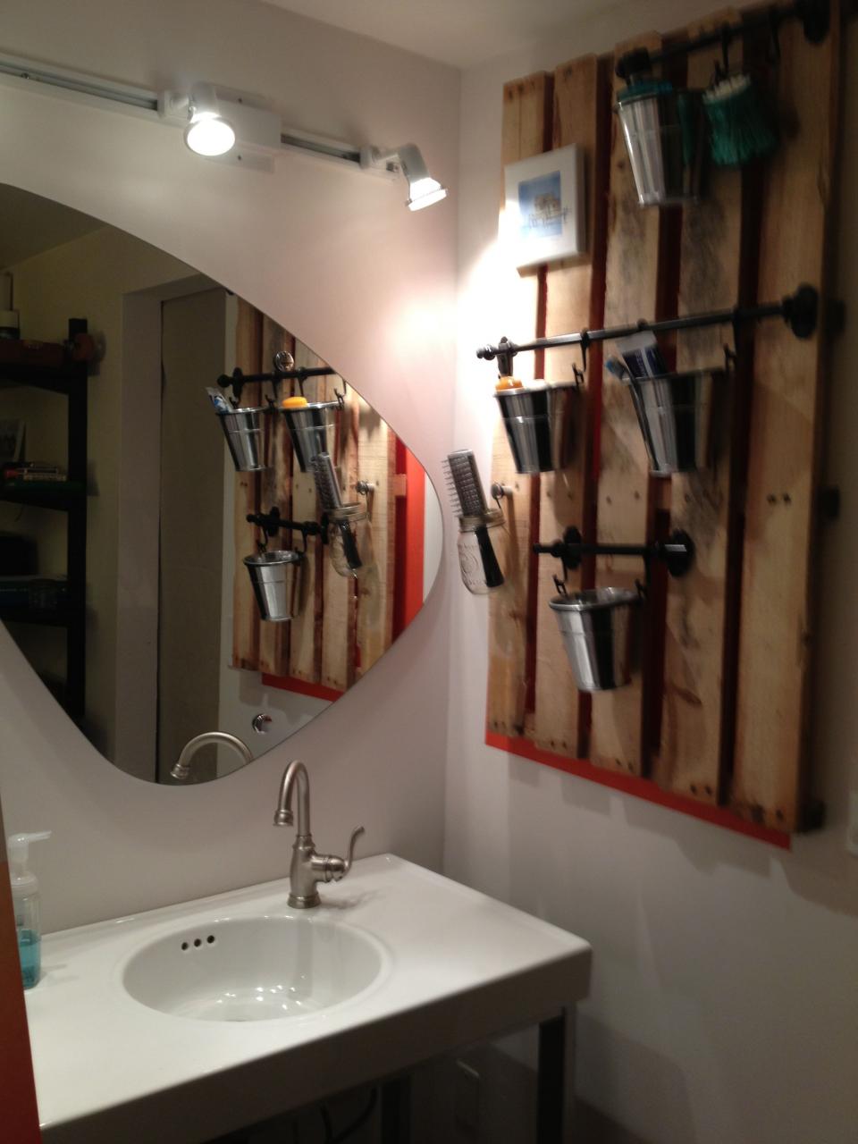 "Funky" bathroom update using Ikea mirror and recycled pallet. Recycled