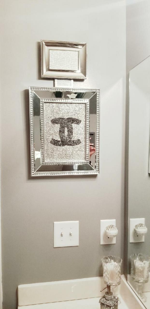 Chanel bottle bathroom wall decor created from Picture frames. Bathroom