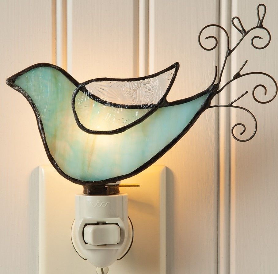 This elegant glass bluebird night light provides extra light in an