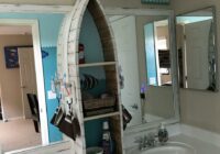 Canoe shelf in underwater themed bathroom. Lake house bathroom, Lake