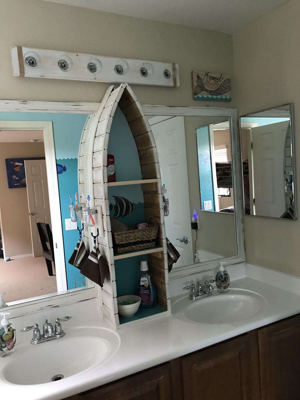 Canoe shelf in underwater themed bathroom. Lake house bathroom, Lake