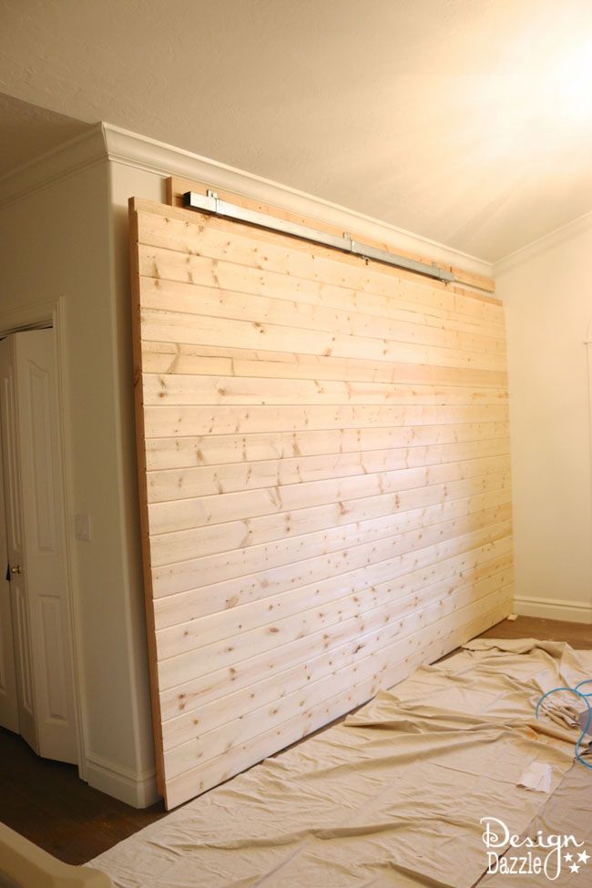 How to build a sliding wall to create a secret room. Yes, the wall