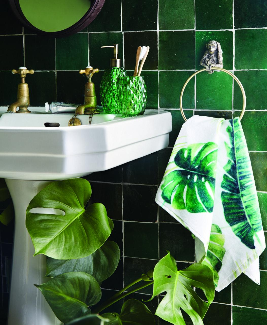 If you're looking to create a tropical themed bathroom then pair green