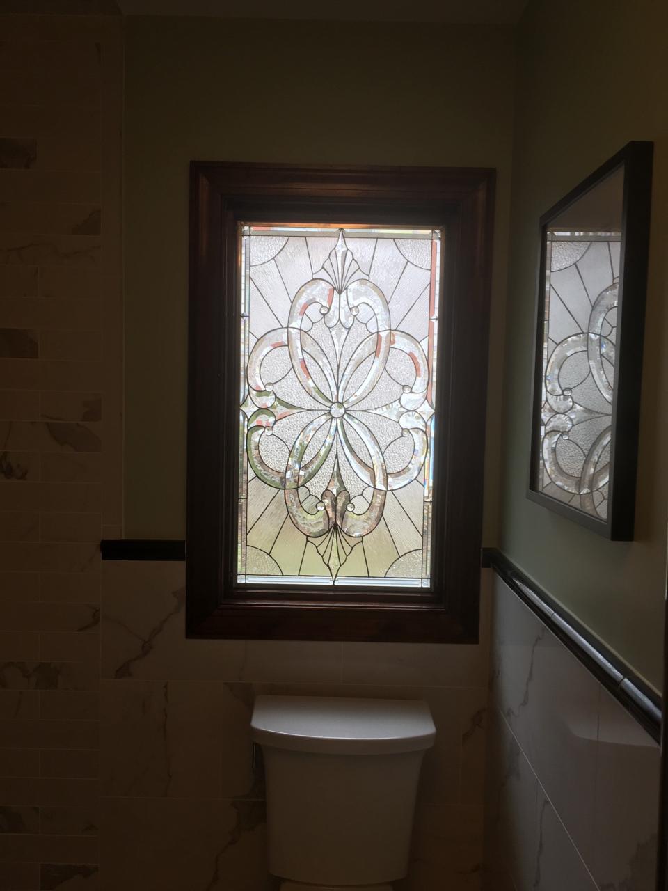 Beautiful Beveled Stained Glass Window Used As An Insert For A Bathroom