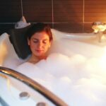 When's the best time to take a warm bath for better sleep?
