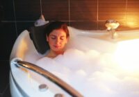 When's the best time to take a warm bath for better sleep?